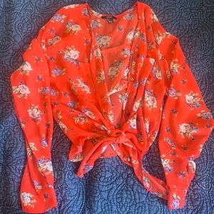 Sheer, front tied blouse.